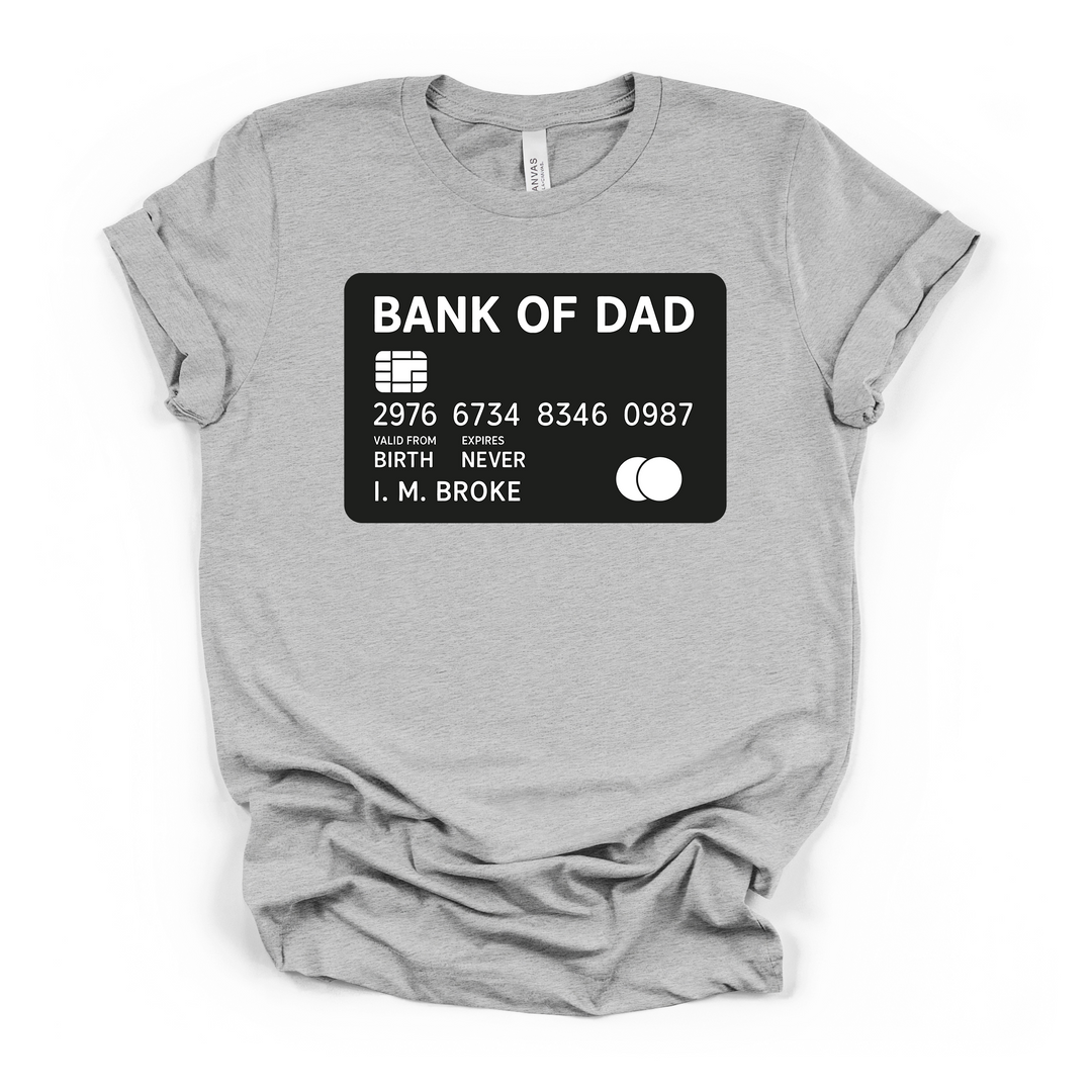 Bank of Dad funny credit card graphic t-shirt in athletic heather with bold white text and I.M. Broke cardholder name