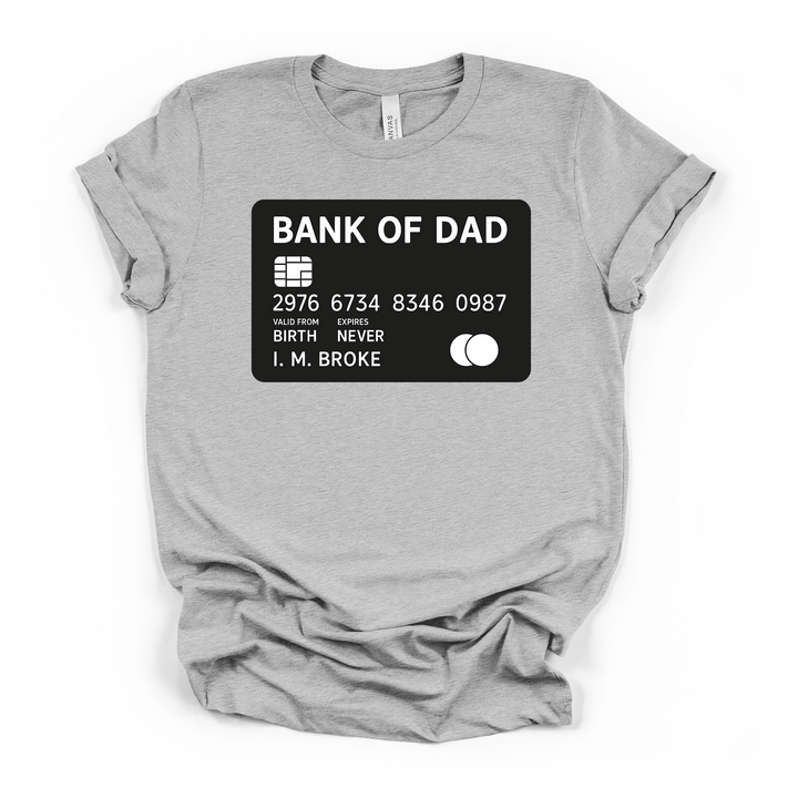 Bank of Dad funny credit card graphic t-shirt in athletic heather with bold white text and I.M. Broke cardholder name