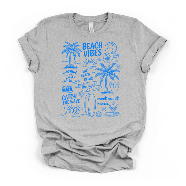 Athletic heather t-shirt with a blue hand-drawn Beach Vibes doodle graphic featuring palm trees surfboards waves flip flops and summer phrases on the front
