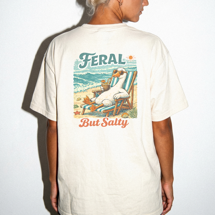 Feral but salty funny retro beach duck back print shirt in ivory