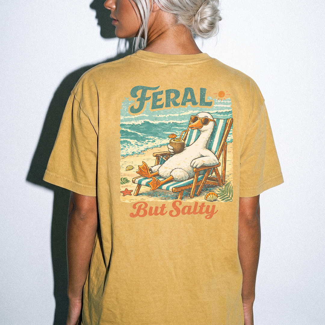 Feral but salty funny retro beach duck back print shirt in mustard