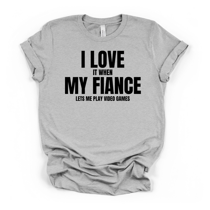 I Love It When My Fiance Lets Me Play Video Games funny gamer t-shirt in athletic heather with bold black lettering