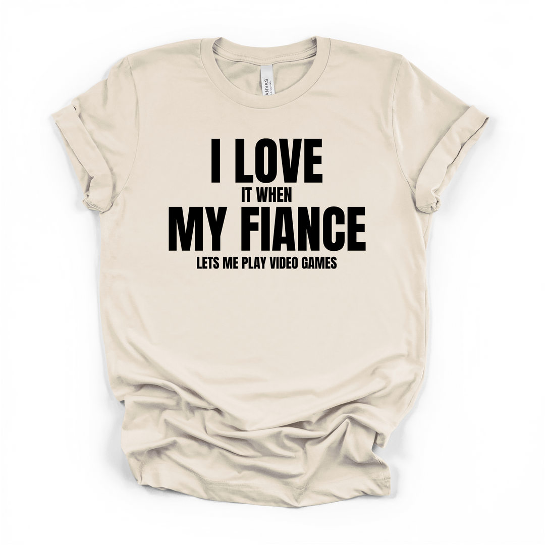 I Love It When My Fiance Lets Me Play Video Games funny gamer t-shirt in natural with bold black lettering