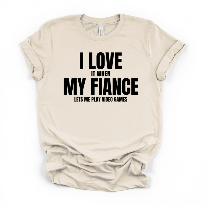 I Love It When My Fiance Lets Me Play Video Games funny gamer t-shirt in natural with bold black lettering