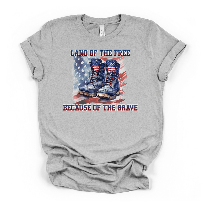 Athletic heather t-shirt with watercolor military combat boots and American flag graphic with Land of the Free Because of the Brave text