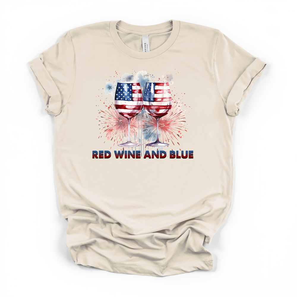 Natural cream t-shirt with watercolor American flag wine glasses clinking with fireworks and Red Wine and Blue printed below the graphic
