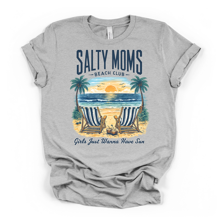 Athletic heather t-shirt with a sunset beach scene graphic with striped chairs and palm trees and Salty Moms Beach Club Girls Just Wanna Have Sun printed on front