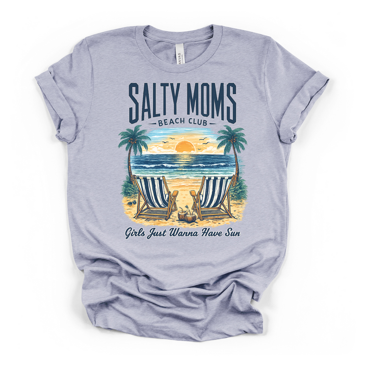 Heather blue t-shirt with a colorful beach sunset graphic with palm trees and striped chairs and Salty Moms Beach Club Girls Just Wanna Have Sun printed on front