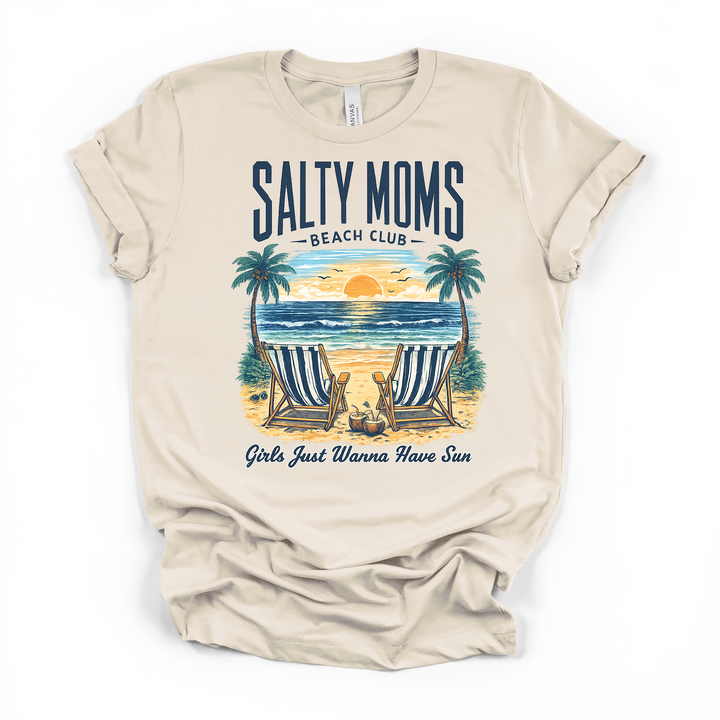 Natural cream t-shirt with a tropical beach sunset scene featuring two striped chairs and palm trees with Salty Moms Beach Club and Girls Just Wanna Have Sun text