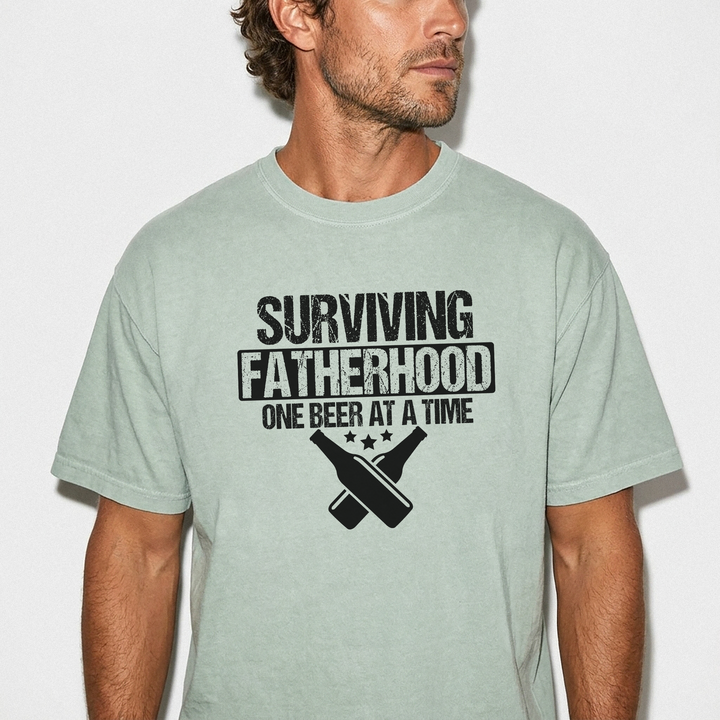 Surviving fatherhood one beer at a time funny dad shirt in bay