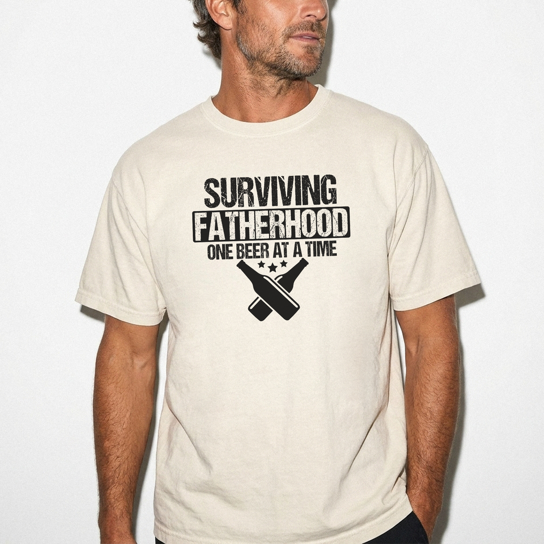 Surviving fatherhood one beer at a time funny dad shirt in ivory