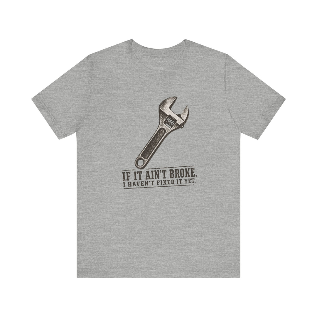 Athletic heather funny mechanic shirt with vintage adjustable wrench illustration and if it ain't broke i haven't fixed it yet bold stamped typography graphic