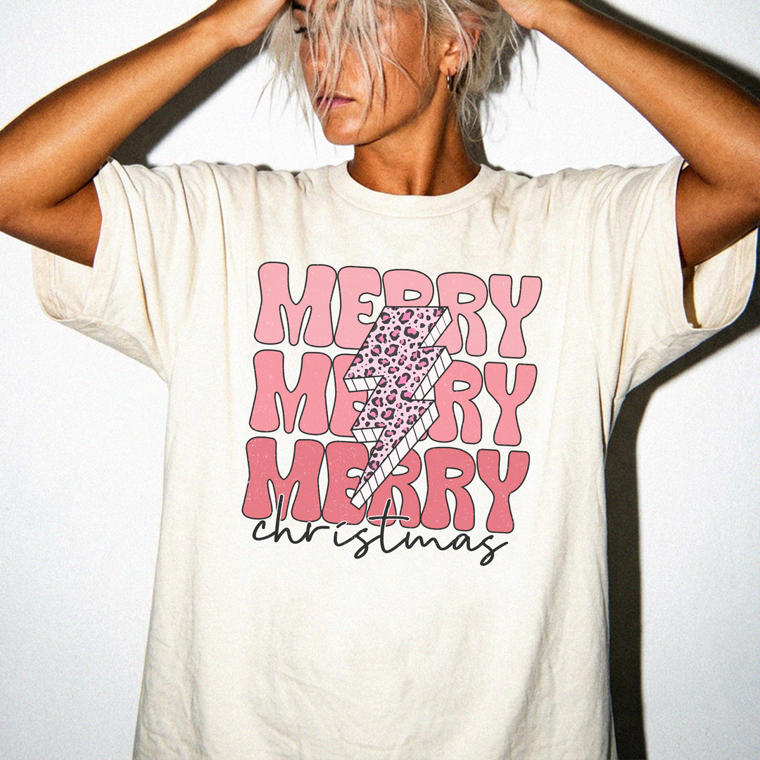 Merry Merry Christmas leopard lightning bolt graphic tee in Ivory with stacked retro pink text and script christmas